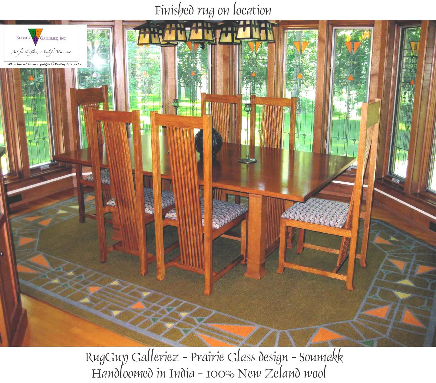 Wooden dining table and chairs on patterned rug