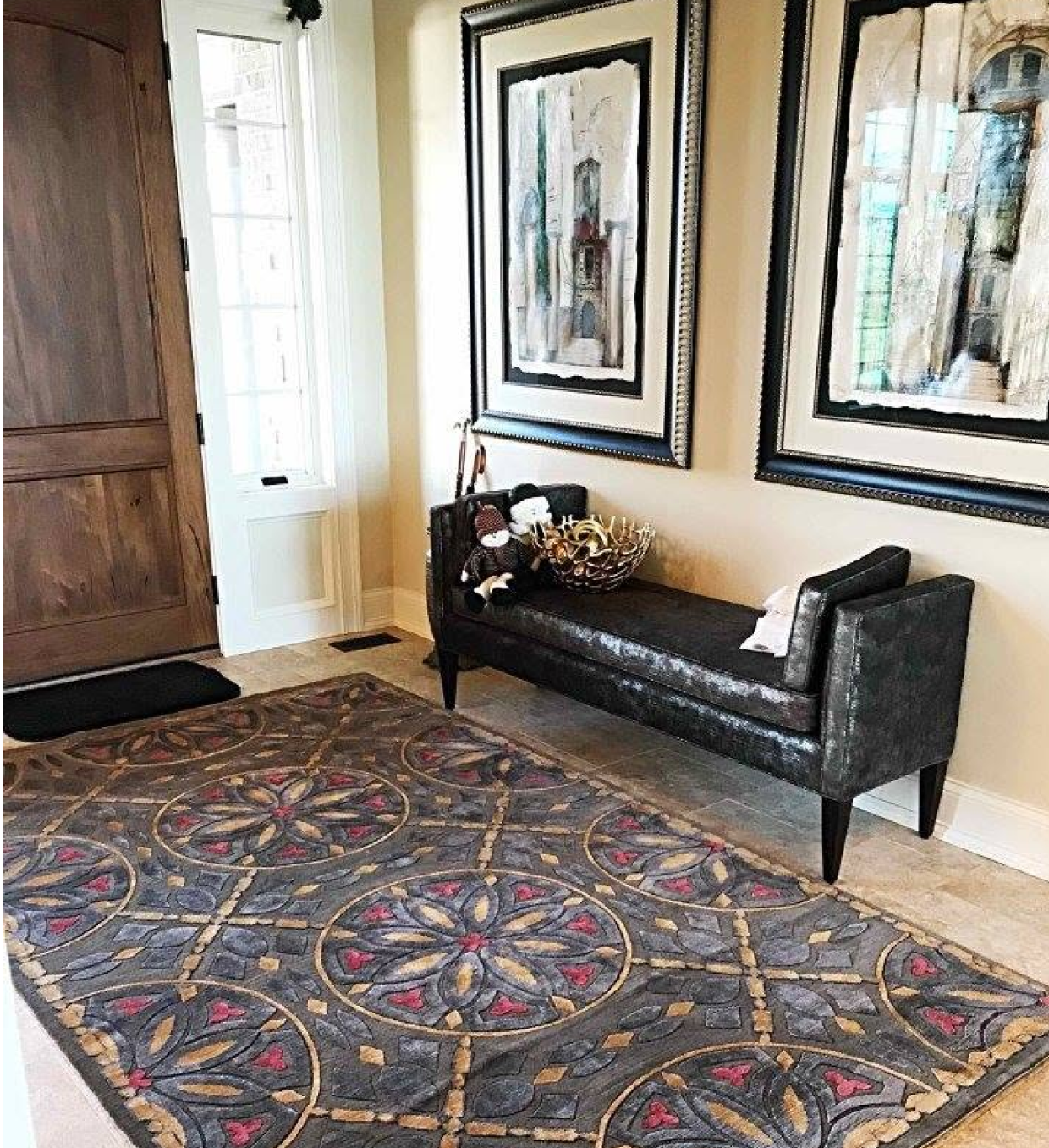 Elegant hallway with bench and decorative rug.